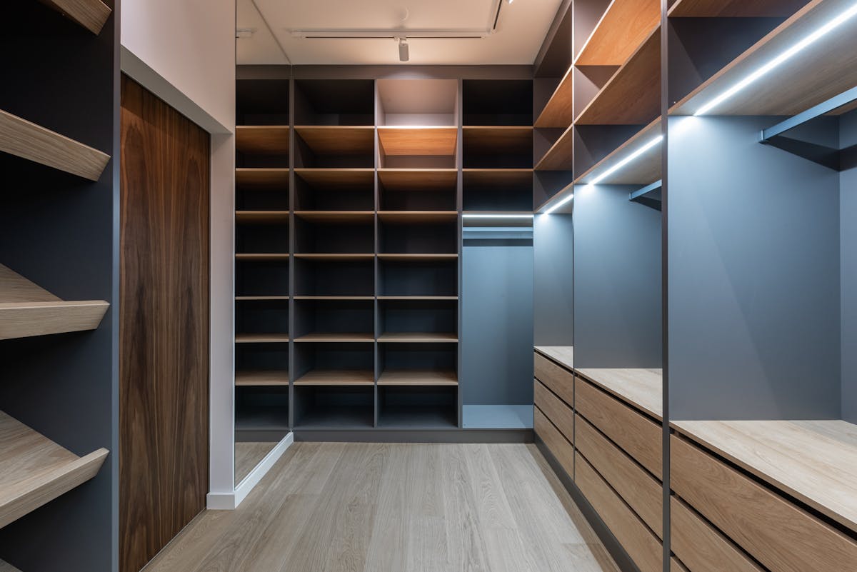 Luxury walk-in closet with custom shelving