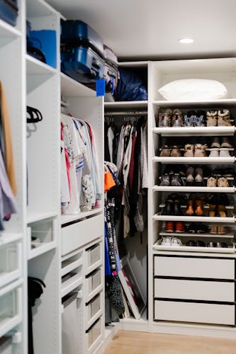 Wardrobe with organized clothes and shoes